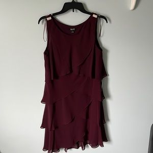 Burgundy dress with rhinestones on top!